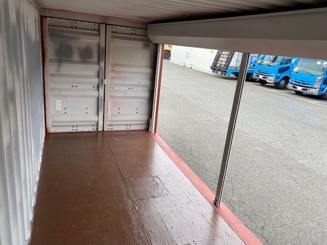 中古20ft ドライスチールコンテナ　左パネルフルシャッター付き　赤茶