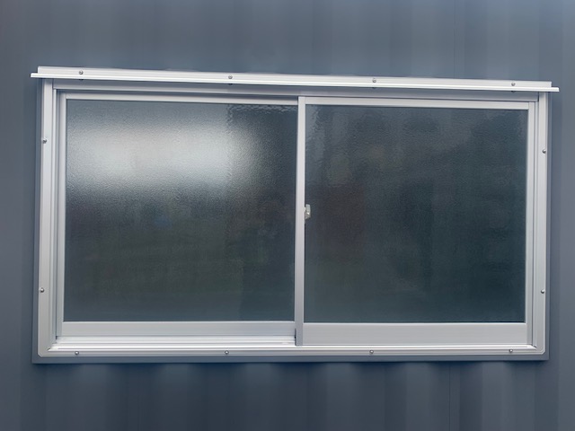 【神戸】中古20ftドライスチールコンテナ　グレー塗装、片開きドア、引き違い窓付き　TKCU2967440